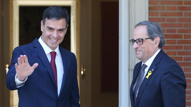 El presidente del Gobierno, Pedro Sánchez, y el presidente catalán, Quim Torra